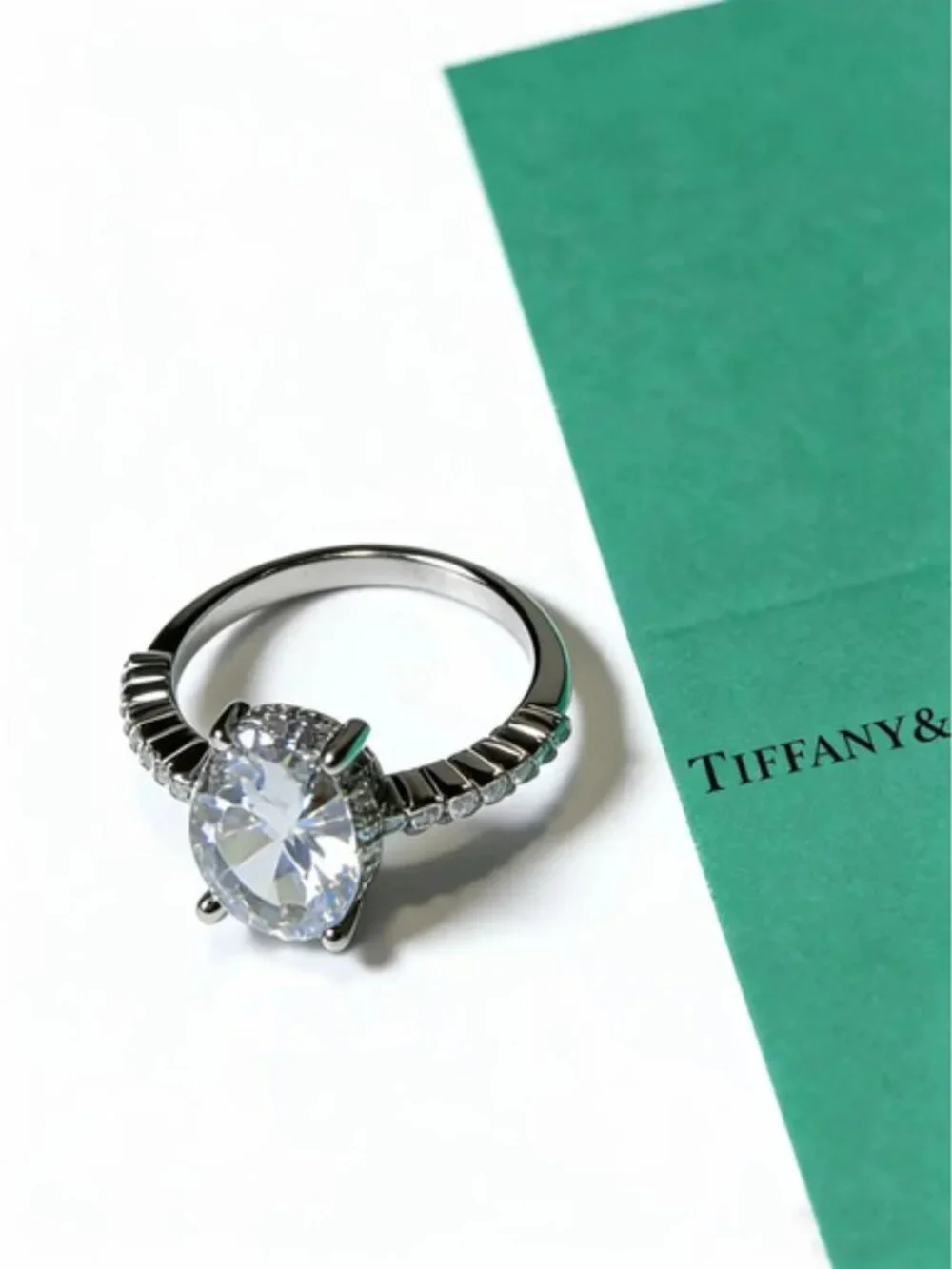 Tiffany & Co. Oval Center Stone and Side Stone Ring